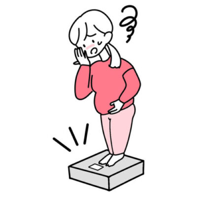 太ってショックを受けている女性　ダイエットしたい　太ったから戻したい